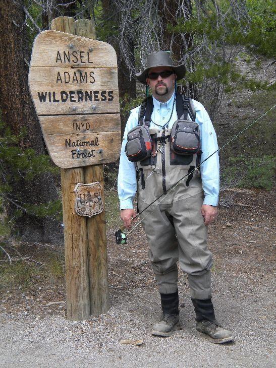Dustin next to the Ansel Adams Wilderness Sign